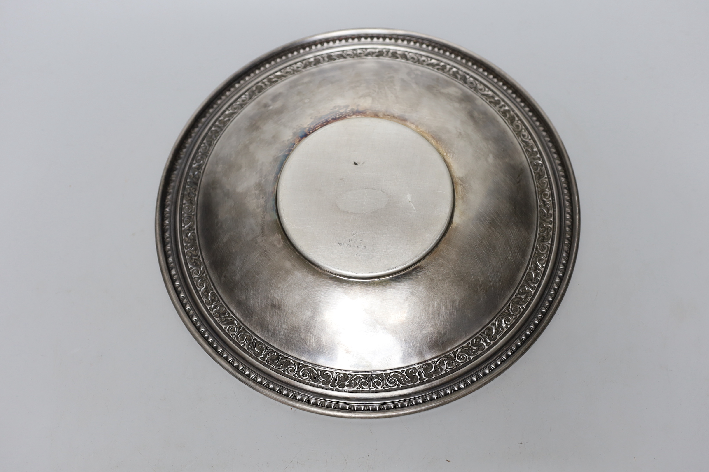 A silvered plate by Reed & Barton, 27cm diameter